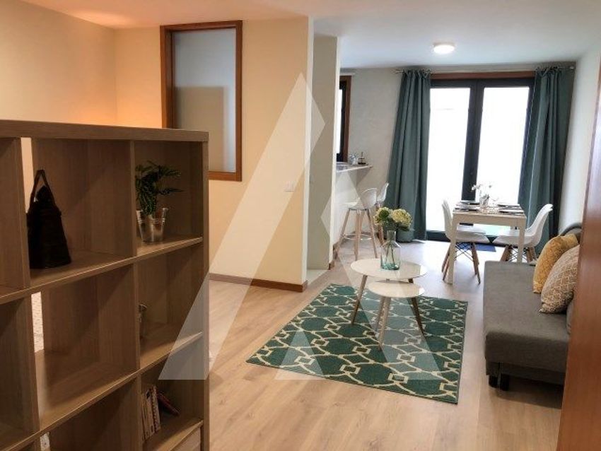 Imagem Sala de estar de apartamento t0 em Rua Eça de Queiroz