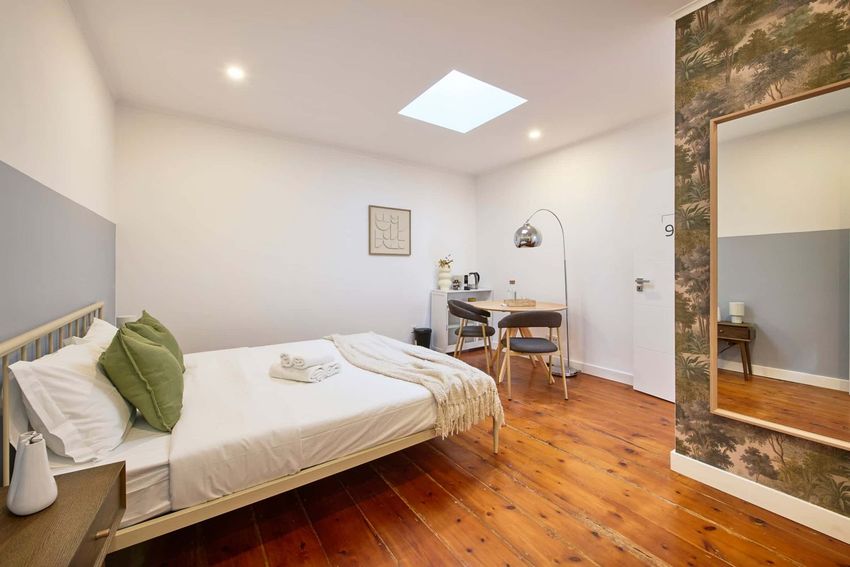 Imagem Sala de estar de quarto em Rua Alexandre Herculano, 39