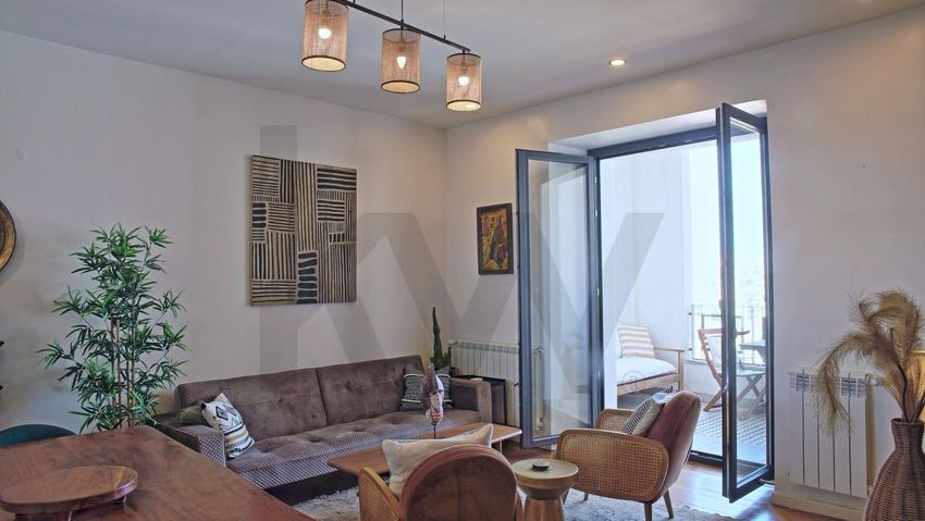 Imagem Sala de estar de apartamento t4 em Rua Damasceno Monteiro, 49
