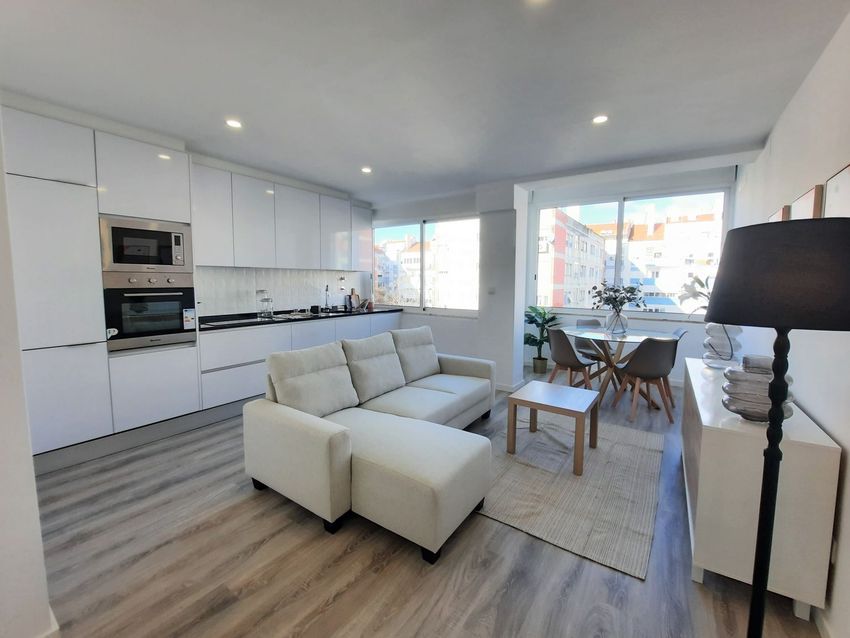 Imagem Sala de estar de apartamento t3 em Rua República da Bolívia