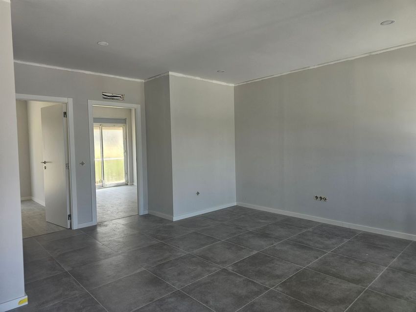 Imagem Sala de estar de apartamento t4 em Gumirães - Santa Eugénia