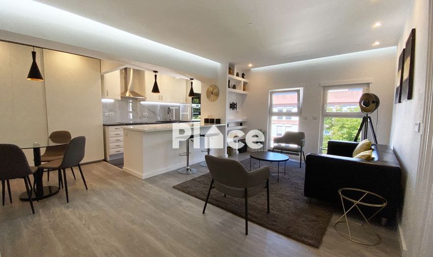 Imagem Sala de estar de apartamento t2 em Rua Ana de Castro Osório