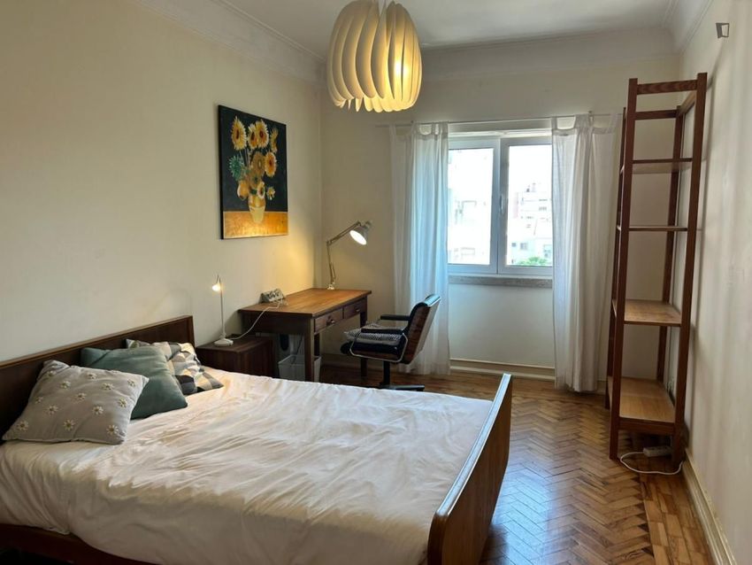 Imagem Sala de estar de quarto em Praça Gonçalo Trancoso
