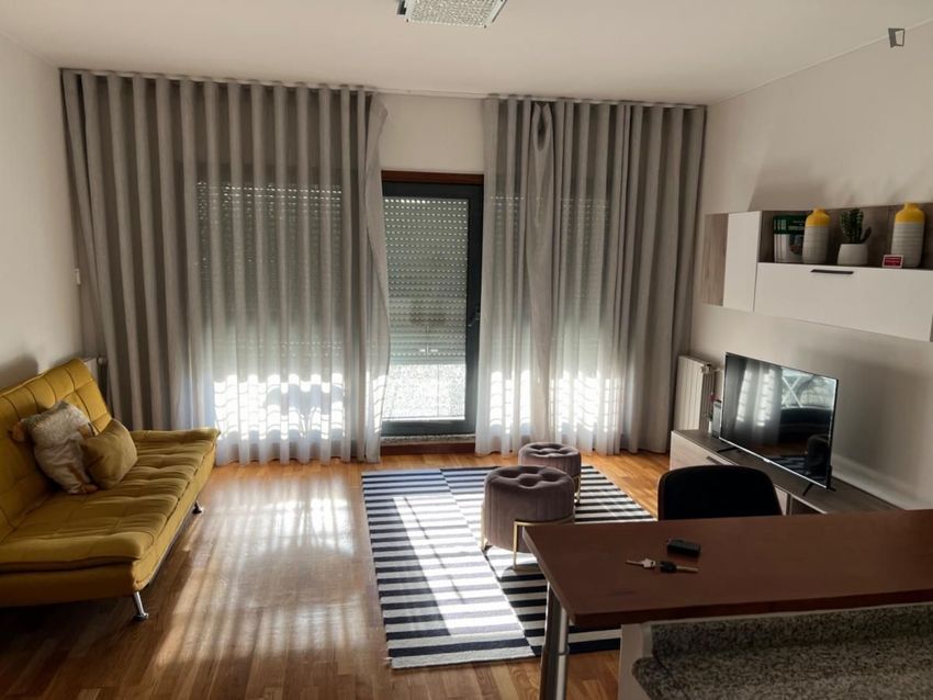 Imagem Sala de estar de apartamento t1 em Rua de Júlio Dinis
