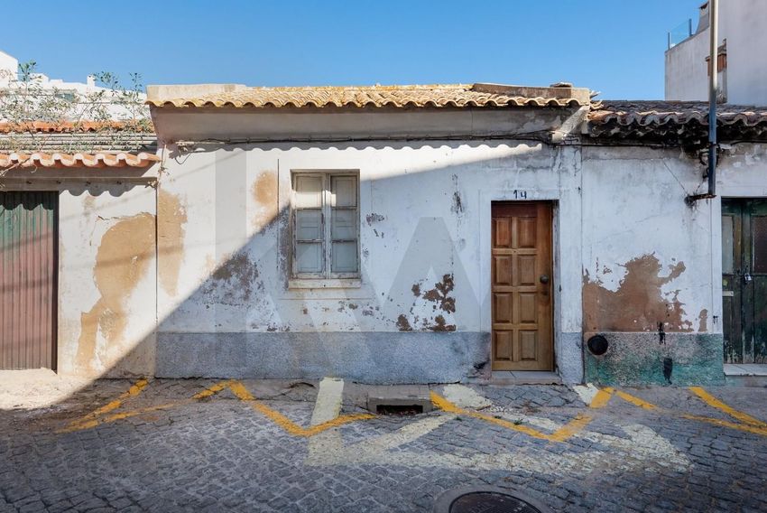 Imagem Fachada de  casa ou moradia em Centro