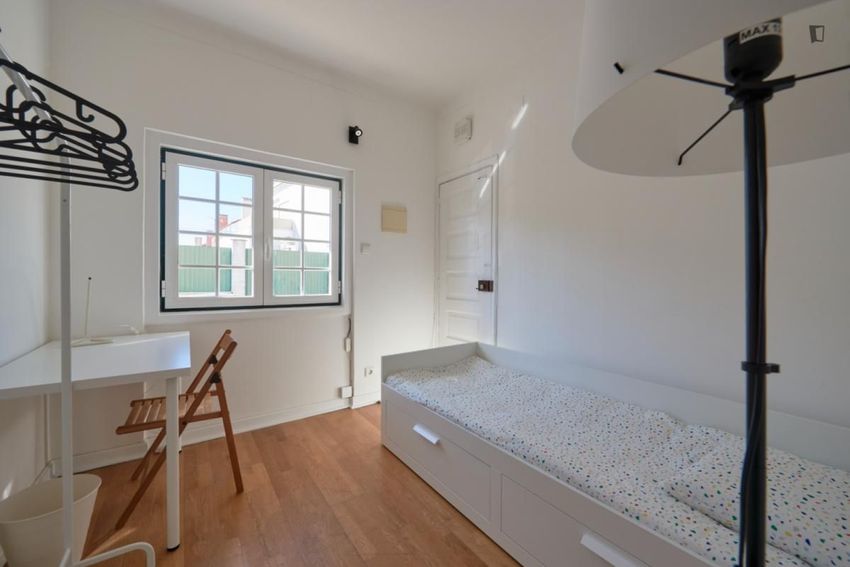 Imagem Sala de estar de quarto em Alto da Ajuda
