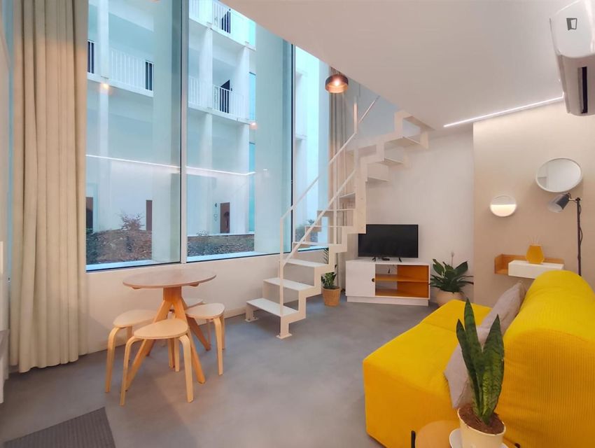 Imagem Sala de estar de apartamento t0 em Avenida Doutor Lourenço Peixinho