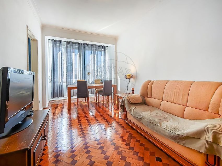 Imagem Sala de estar de apartamento t3 em Encosta do Sol