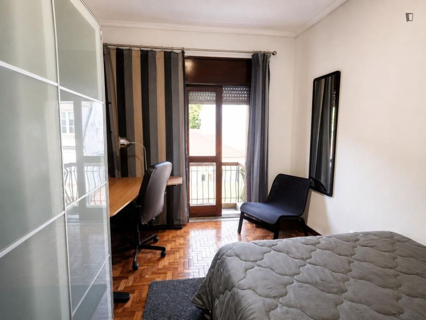 Imagem Sala de estar de quarto em Rua de Gonçalo Cristóvão