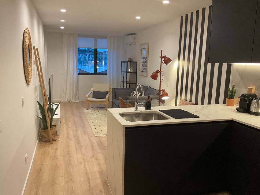 Imagem Sala de estar de apartamento t1 em Rua Nova do Rio, 201