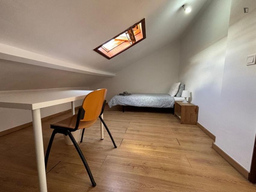 Imagem Sala de estar de quarto em Rua Particular à Ajuda