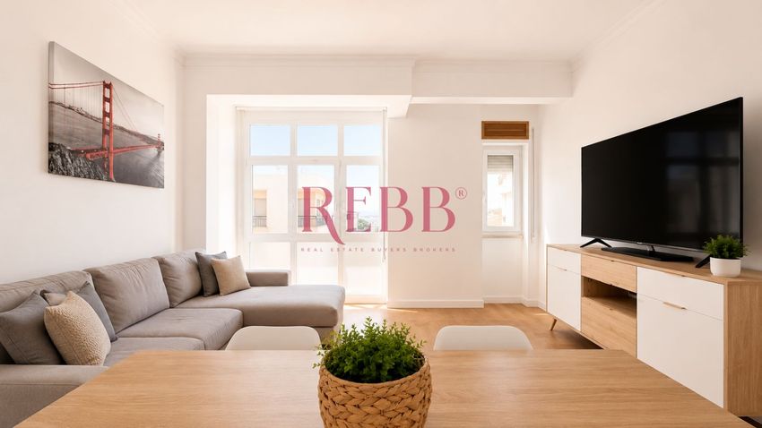 Imagem Sala de estar de apartamento t3 em Rua Oliveira Martins