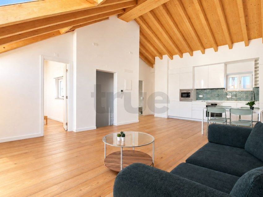 Imagem Sala de estar de penthouse em Costa do Castelo
