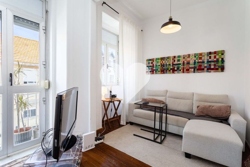Imagem Sala de estar de apartamento t1 em Rua 1º de Maio, 11