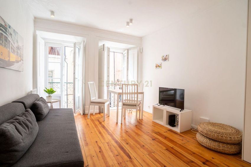 Imagem Sala de estar de apartamento t1 em Rua da Adiça, 12 a 18