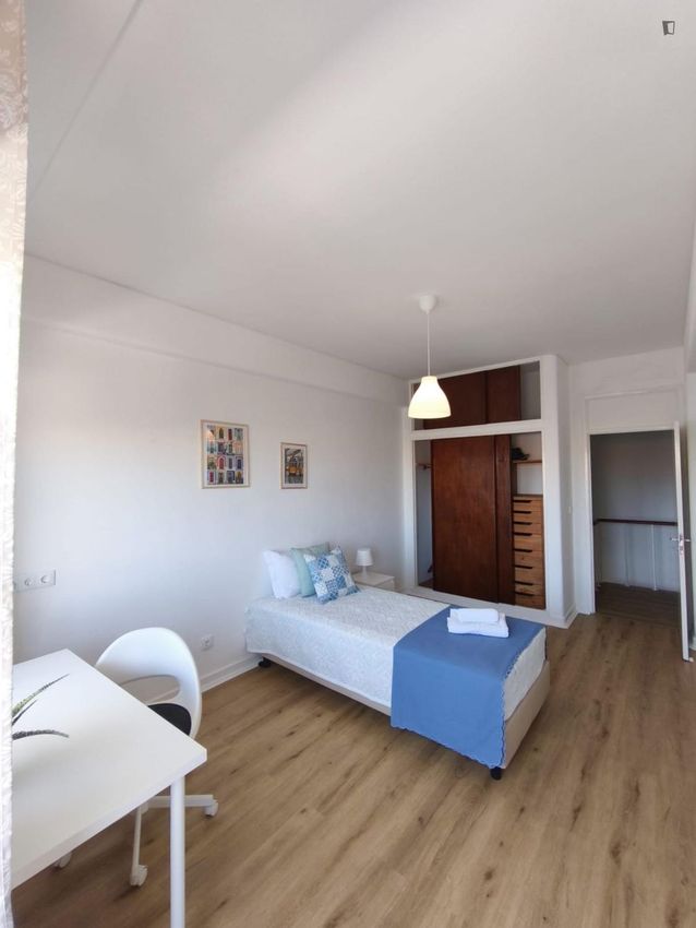 Imagem Sala de estar de quarto em Avenida dos Estados Unidos da América