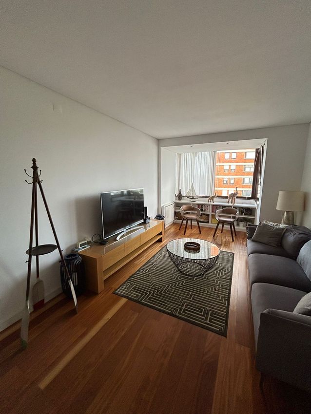 Imagem Sala de estar de quarto em Rua Rui de Pina, 83