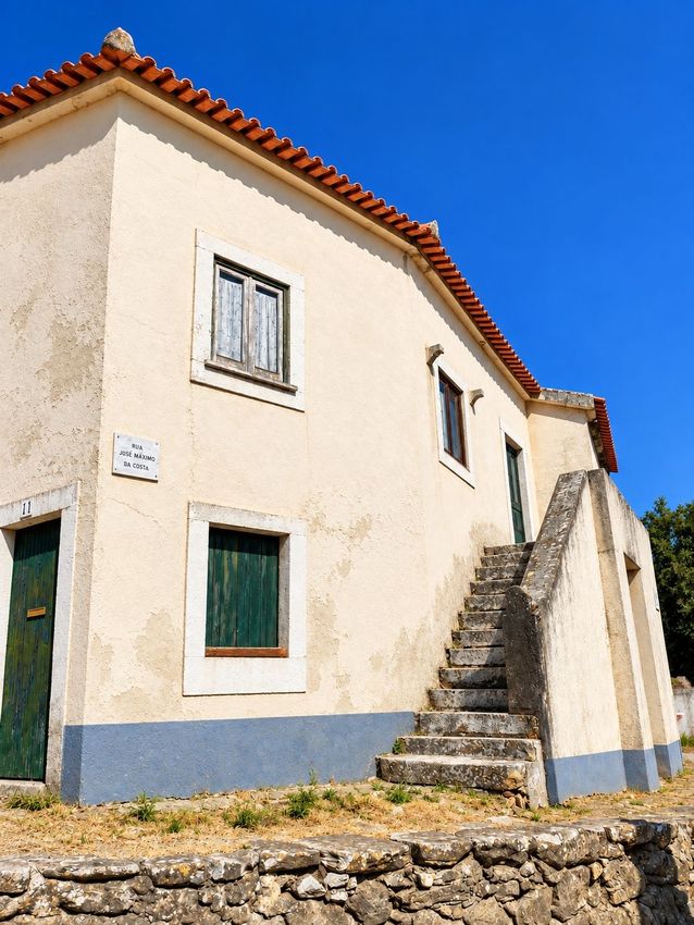 Imagem Fachada de  casa de aldeia em Rua José Máximo da costa 2530-319, 11