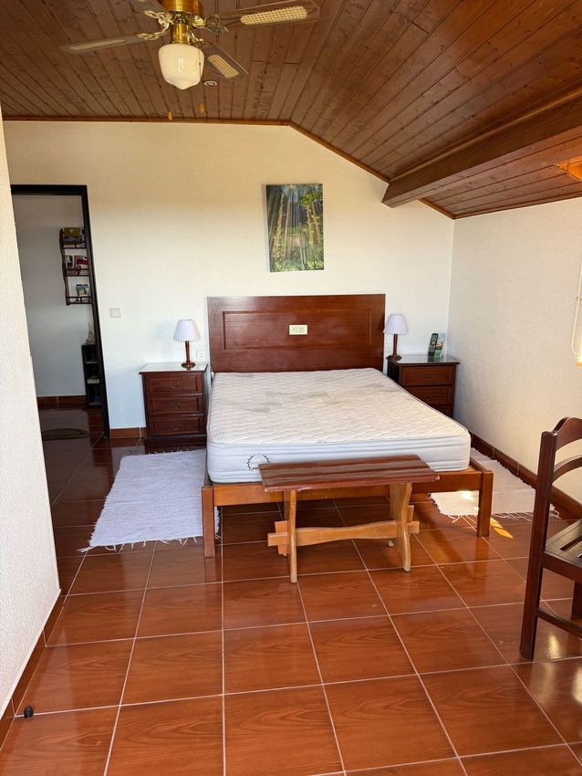 Imagem Sala de estar de quarto em Rua dos Currais, 9