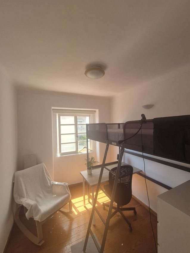 Imagem Sala de estar de quarto em Avenida Rainha Dona Leonor, 4