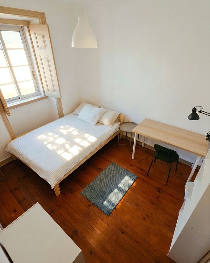 Imagem Sala de estar de quarto em Rua da Glória