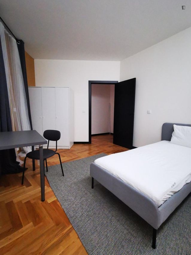 Imagem Sala de estar de quarto em Rua do Corvo