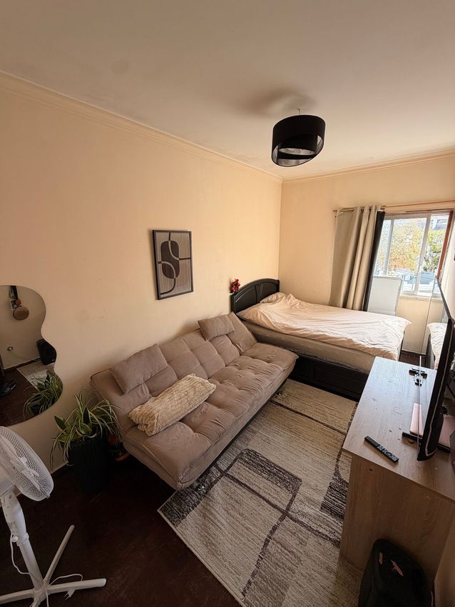 Imagem Sala de estar de quarto em Rua do Moinho, 5