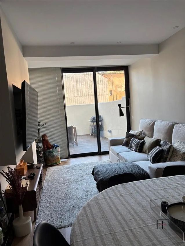 Imagem Sala de estar de apartamento t1 em Rua Cândida Sá de Albergaria