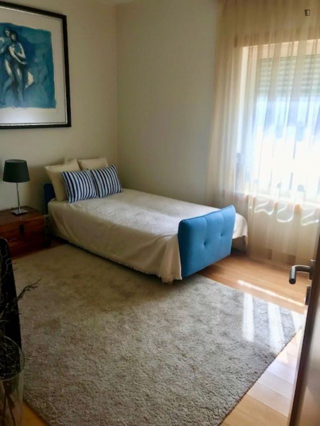 Imagem Sala de estar de quarto em Rua Doutor José da Cunha